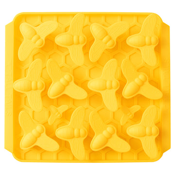 Yellow butterfly-shaped silicone mold on a white background