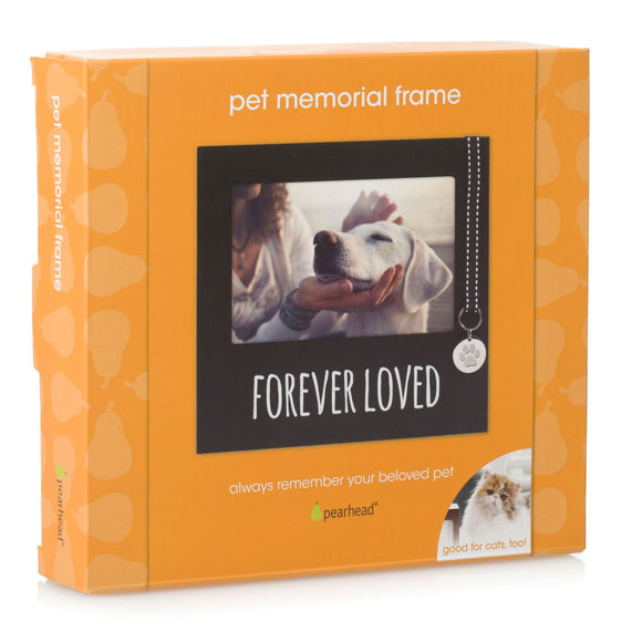 Orange packaging of a pet memorial frame with a photo of a dog and text 'Forever Loved' on a white background.