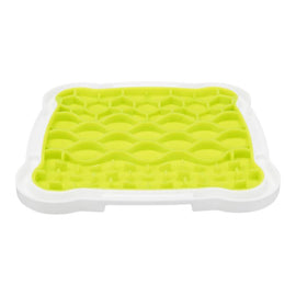 Green silicone mat with white border on a white background
