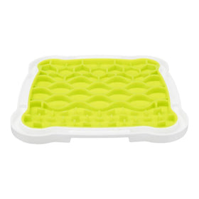 Green silicone mat with white border on a white background