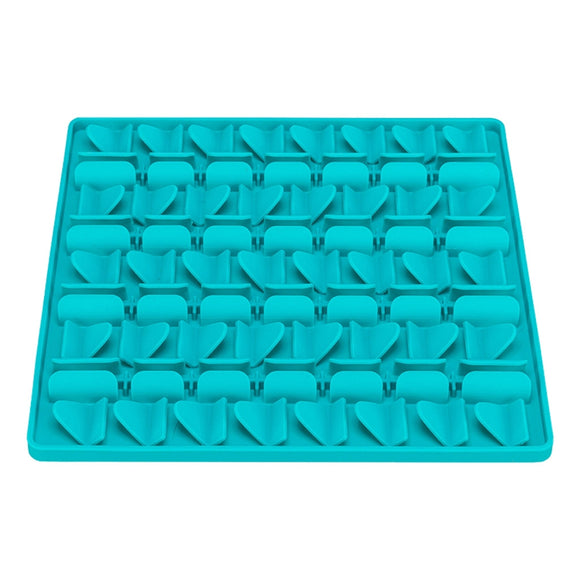 Turquoise silicone mold tray on a white background