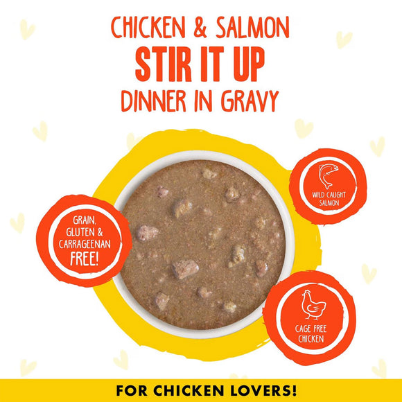 Dog food package with chicken and salmon text, featuring a bowl of dog food on a white background.
