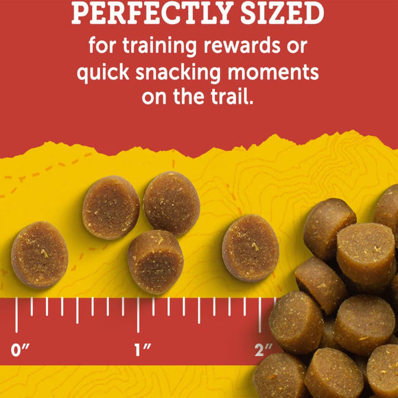 Dog treats on a yellow surface with text about training rewards and quick snacking moments.