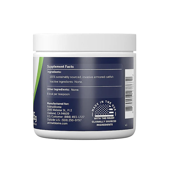 Supplement container with label showing ingredient list and manufacturing details on a white background