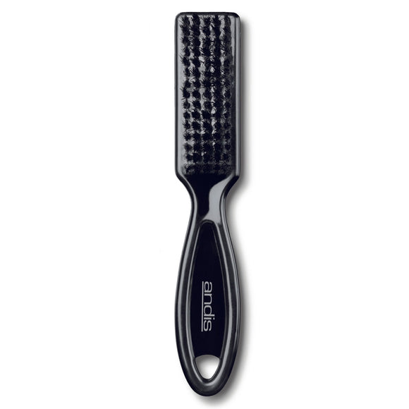 Black hairbrush with textured head on a white background