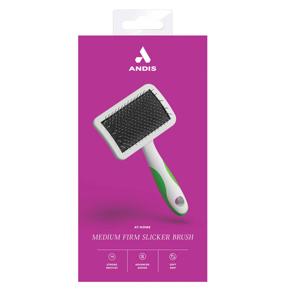 Andis medium firm slicker brush packaging on a purple background