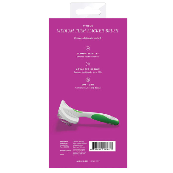 Package of a medium firm slicker brush with purple background and green and white brush.
