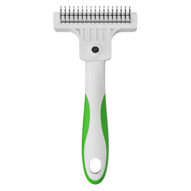 Pet grooming brush with green handle on a white background