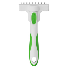 Pet grooming tool with green handle and white head on a white background