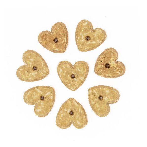 Heart-shaped cookies with a brown center on a white background