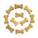Dog treats shaped like bones on a white background