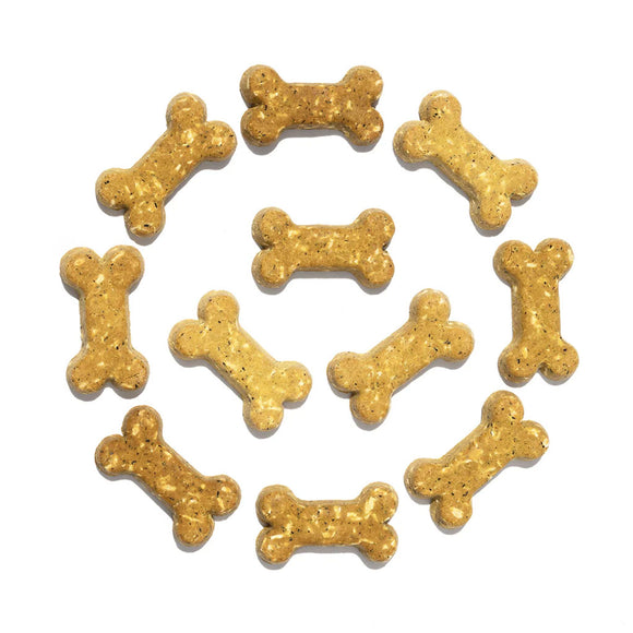 Dog treats shaped like bones on a white background