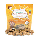 Packaging of Coco-Milk Bones ginger snaps dog treats with visible treats in front