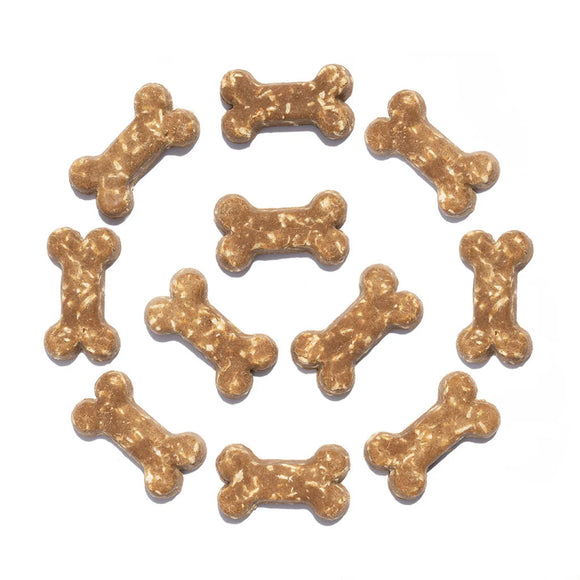 Dog treats shaped like bones on a white background