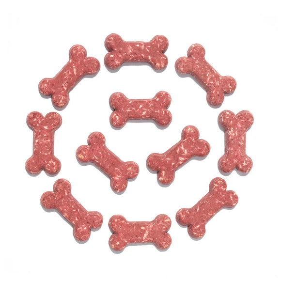 Pink bone-shaped dog treats arranged in a circular pattern on a white background