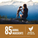 Woman sitting on a rock with a dog, mountains in the background, and text about animal ingredients.