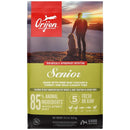 Orijen senior dog food package with a scenic background