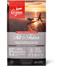 Orijen Fit & Trim dog food package with sunset beach scene and person walking dog.