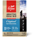 Orijen dog food package with a person and dog on a mountain background