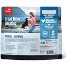 Orijen dog treats packaging with a woman and dog on a mountain background