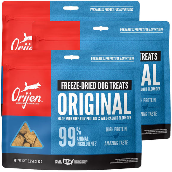 Orijen freeze-dried dog treats packaging with blue and red design.