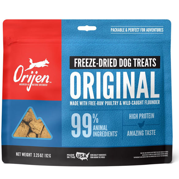 Orijen freeze-dried dog treats packaging with red and blue design.