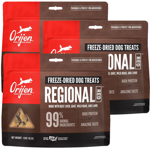 Two packages of freeze-dried dog treats from Orijen and ONAL on a white background.