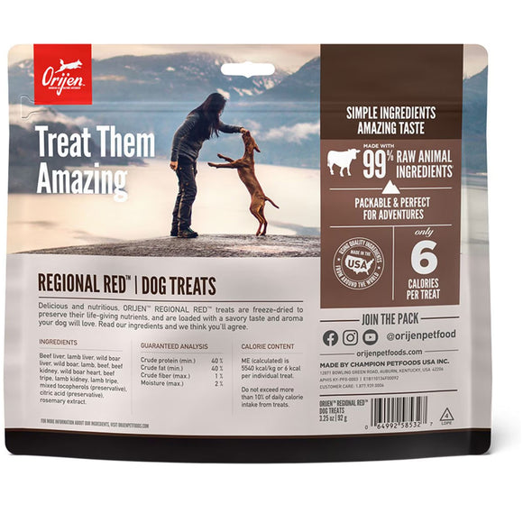 Orijen Regional Red dog treats packaging with a person and dog on a beach