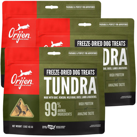 Orijen and DRA freeze-dried dog treat packages on a white background