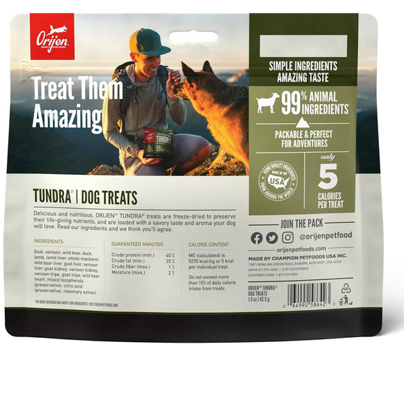 Orijen Tundra dog treats packaging with a man and dog on a mountain background