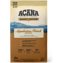 Acana dog food package with mountain and lake design on a beige background