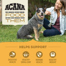 Woman sitting with a dog on grass, promoting Acana pet food benefits.