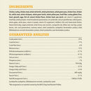 Dog food ingredient list and guaranteed analysis on a beige background