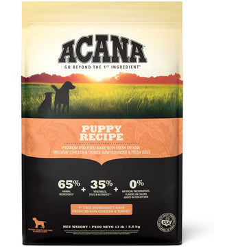 Acana Puppy Recipe dog food package with sunset and dogs silhouette on a field.