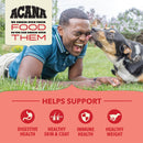 Man lying on grass with a dog licking his face, Acana pet food advertisement.