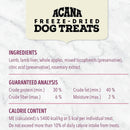 Acana freeze-dried dog treats label with ingredients, guaranteed analysis, and calorie content on a marble background.