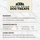 Acana freeze-dried dog treats label with ingredients, guaranteed analysis, and calorie content on a marble background.
