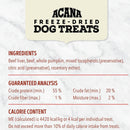Acana Freeze-Dried Dog Treats label with ingredients, guaranteed analysis, and calorie content on a marble background.