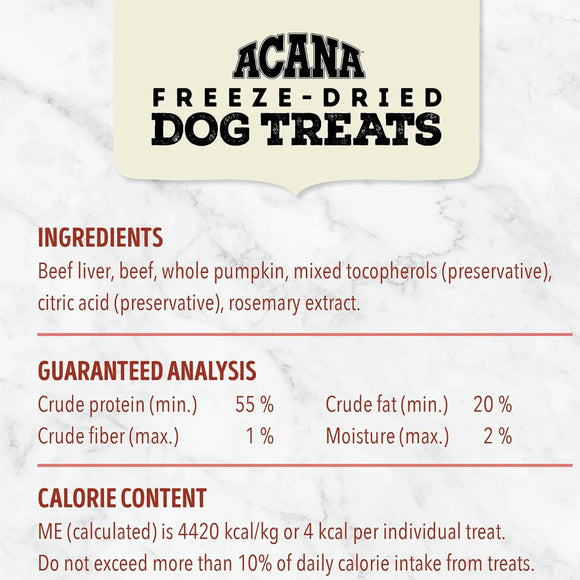Acana Freeze-Dried Dog Treats label with ingredients, guaranteed analysis, and calorie content on a marble background.