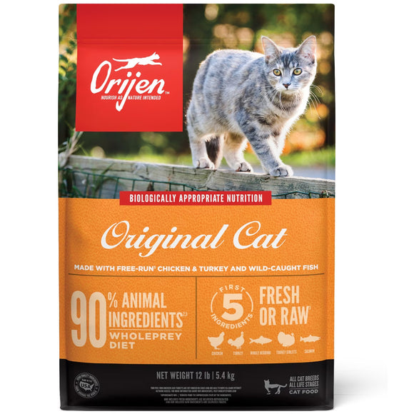 Orijen cat food package with a cat on a log in the background