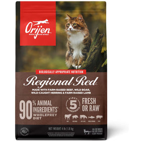 Orijen Regional Red cat food package with a cat on a blurred natural background