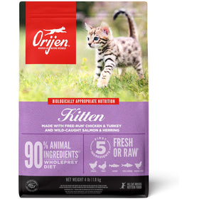 Orijen kitten food package with a kitten on grass