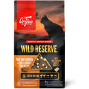 Orijen Wild Reserve cat food package with sunset design and cat silhouette