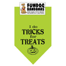 Green dog bandana with 'I do tricks for treats' text and pumpkin graphic, brand 'Fundog Bandanas' visible.