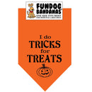 Orange dog bandana with 'I do tricks for treats' text and pumpkin graphic, brand 'Fundog Bandanas' visible.