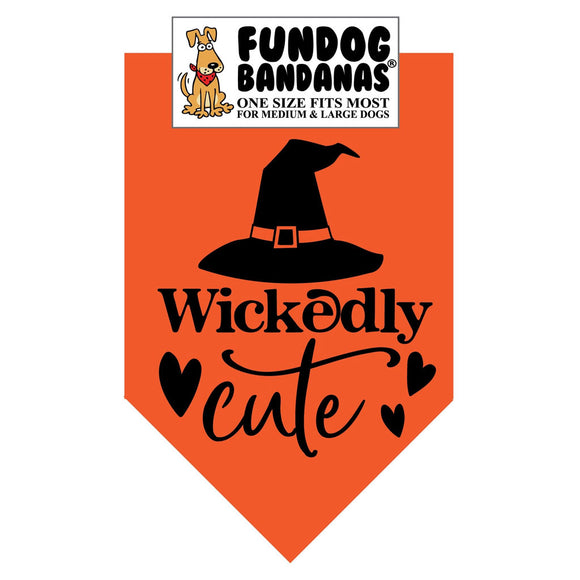 Orange dog bandana with black text and a witch hat design, featuring the brand 'Fundog Bandanas'.