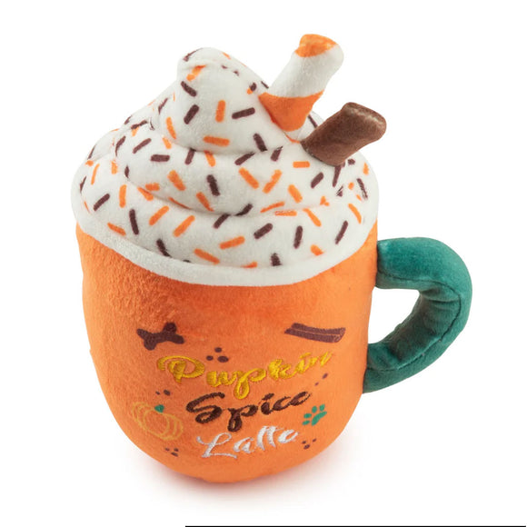 Plush toy resembling a pumpkin spice latte with whipped cream and sprinkles on a white background