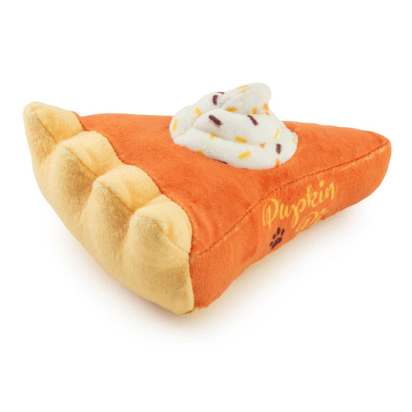 Plush pumpkin pie toy with whipped cream on a white background
