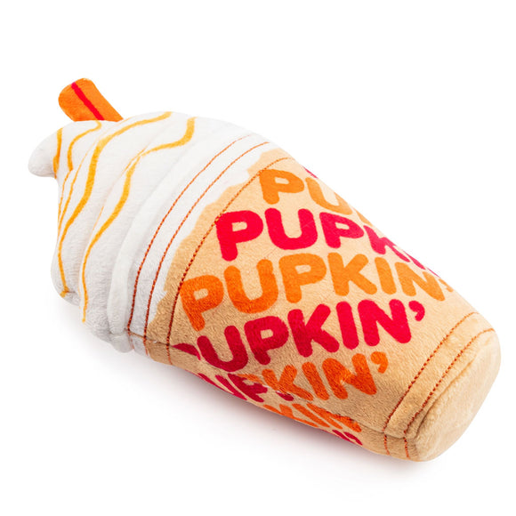 Plush toy resembling a roasted pumpkin with 'Pupkin' text on a white background