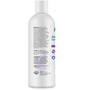 Bottle of Oat Control shampoo with label on a white background